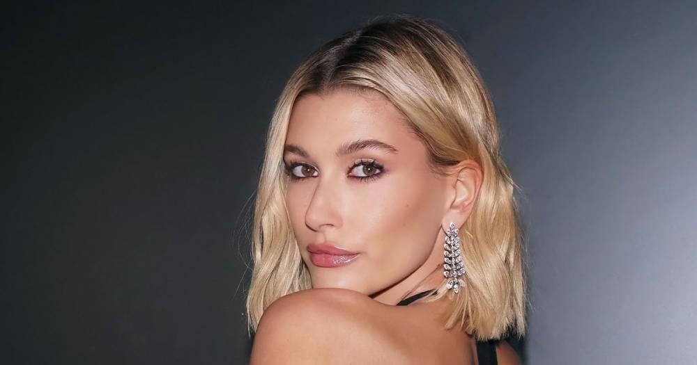 The Meaning Behind All of Hailey Baldwin’s Tattoos — From Matching Friend Designs to Finger Ink - www.usmagazine.com