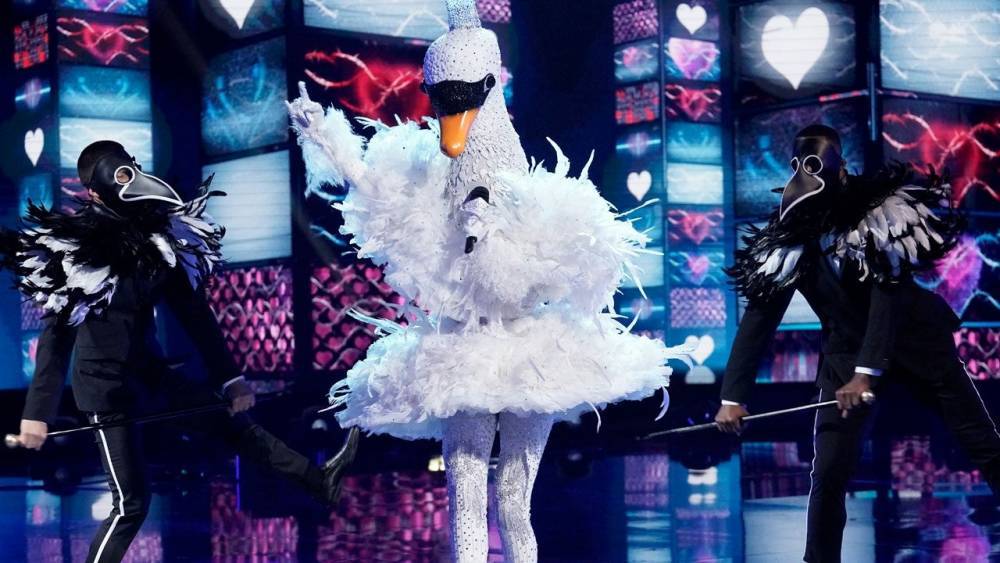 'The Masked Singer': The Swan Takes a Dive in Week 8 -- See Which Star Was Under the Mask! - www.etonline.com