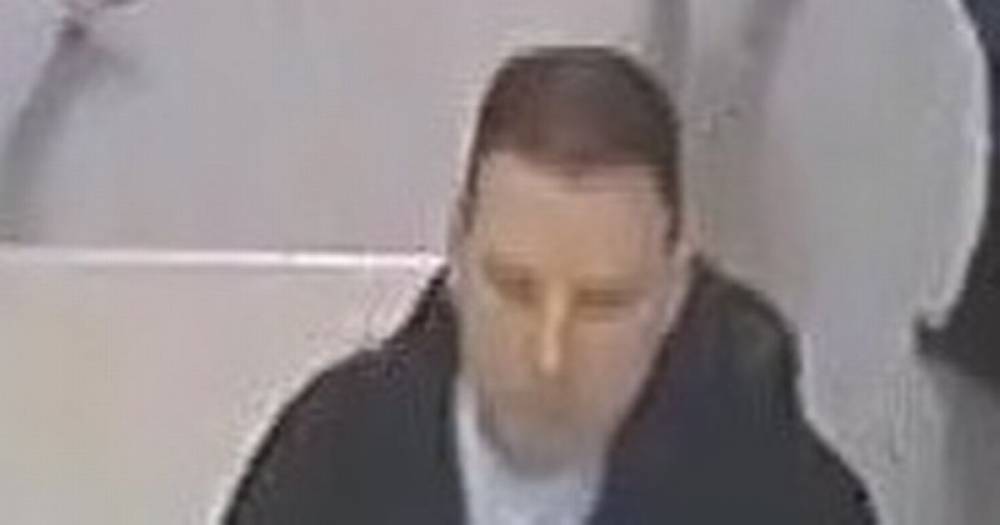 Police investigating racist attack at Manchester Piccadilly where woman had water hurled in her face after abuse want to speak to this man - www.manchestereveningnews.co.uk - Britain - Manchester