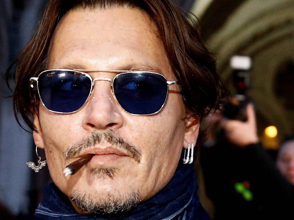Johnny Depp admits to hurting finger after blaming Amber Heard for it - torontosun.com