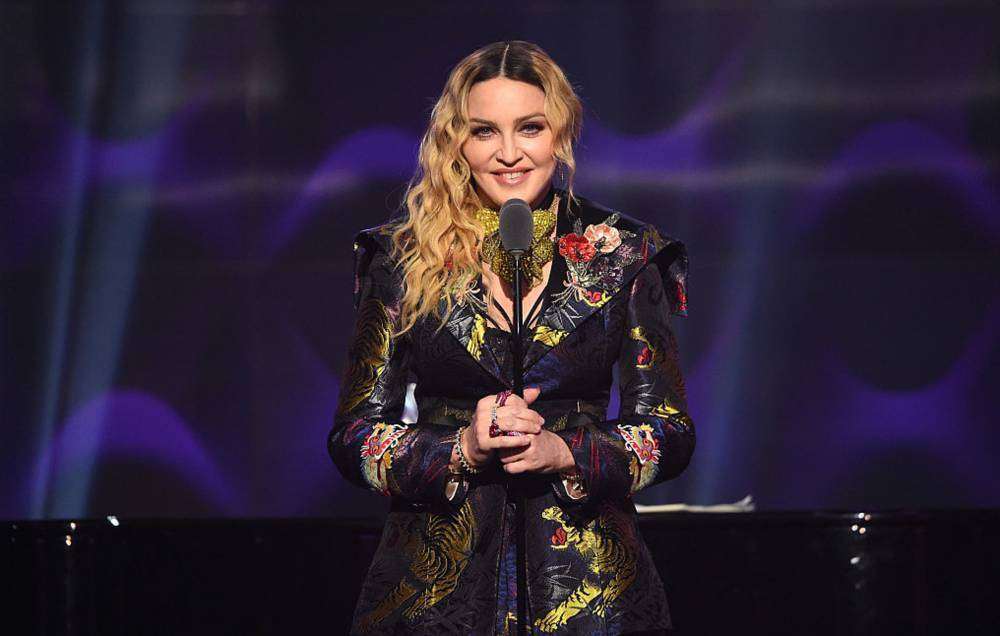 Madonna calls coronavirus “the great equaliser” in new video - www.nme.com