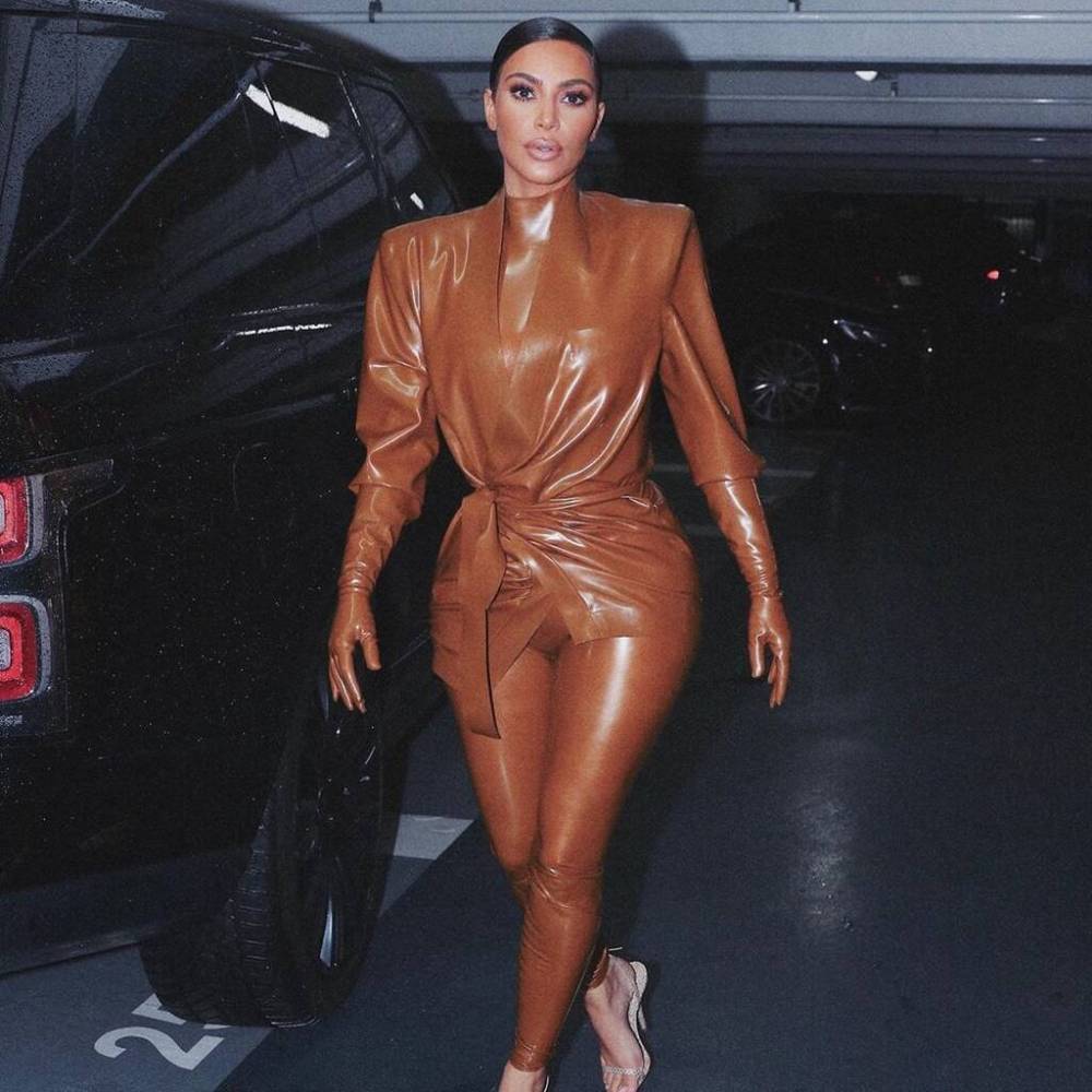 Kim Kardashian almost pulled muscle getting into skin-tight Balmain suit - www.peoplemagazine.co.za - France
