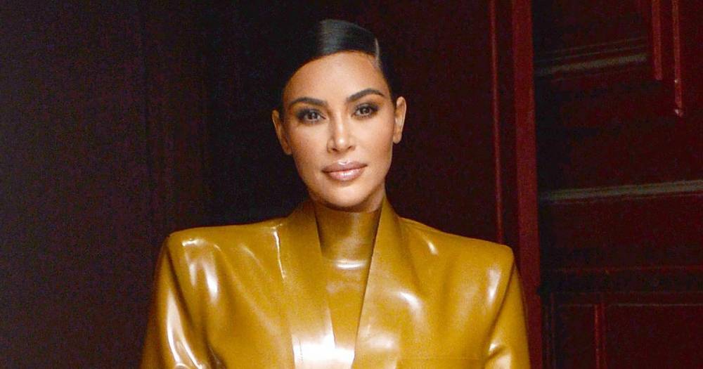 How Kim Kardashian Squeezed Into That Latex Balmain Look for Paris Fashion Week - www.usmagazine.com