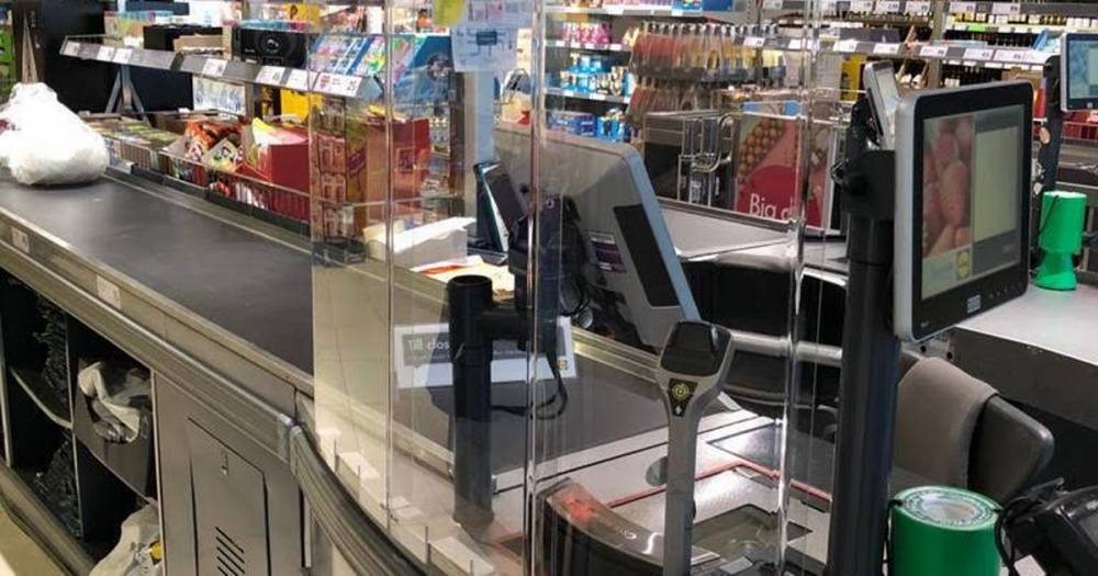 Lidl fitting cough and sneeze proof checkout protection screens in all stores - www.dailyrecord.co.uk - Britain