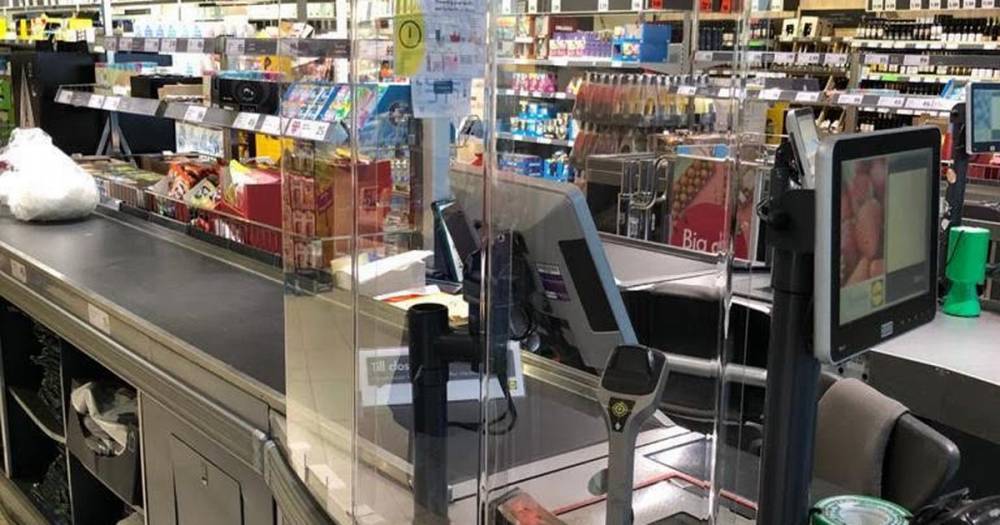 Coronavirus: Lidl installs cough and sneeze-proof screens to separate staff and customers - www.dailyrecord.co.uk - Britain