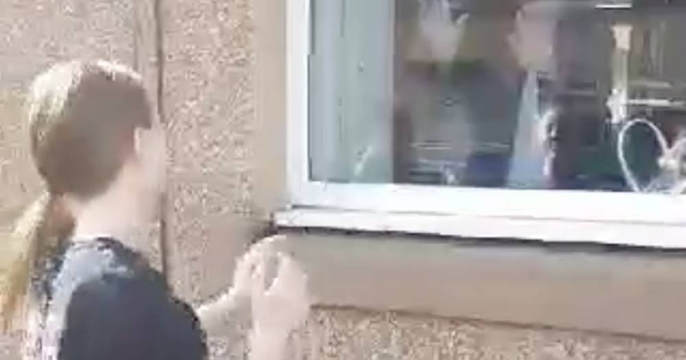Heartwarming moment Scots girl teaches lockdown great-gran TikTok dance through window - www.dailyrecord.co.uk - Scotland