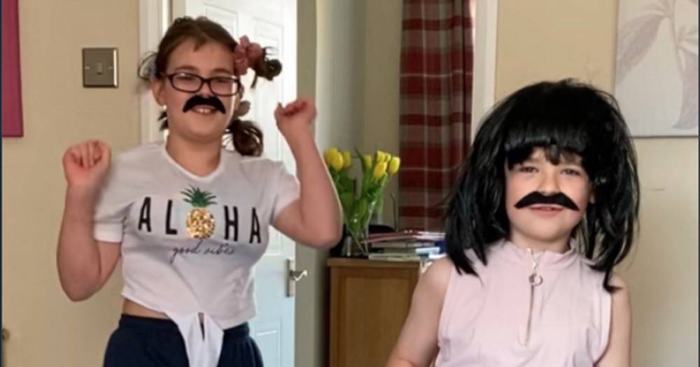 Dad takes home schooling to new level as kids belt out Queen classic in unusual music lesson - www.dailyrecord.co.uk - Britain