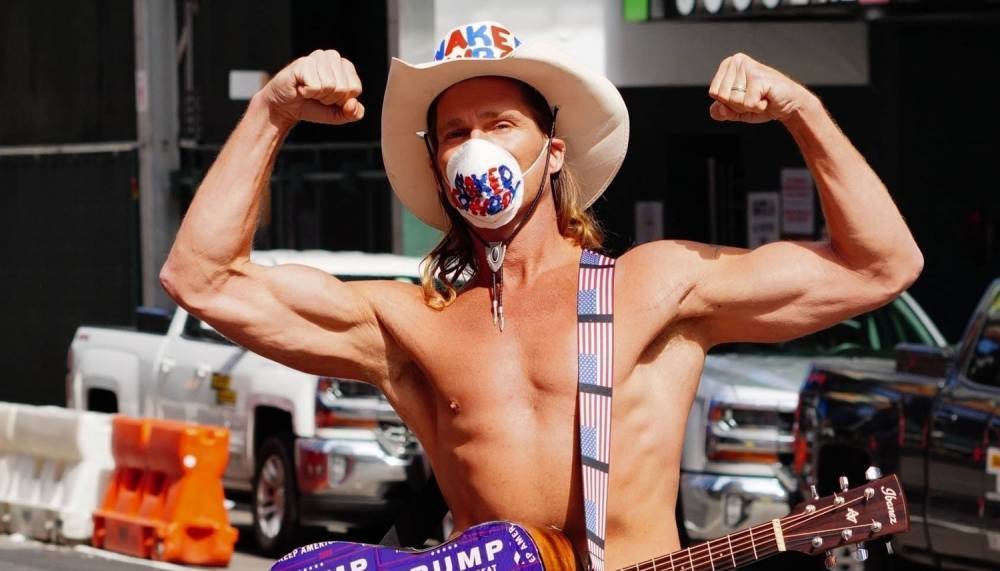 The Naked Cowboy Is Busking in a Face Mask During the Pandemic - www.justjared.com - New York