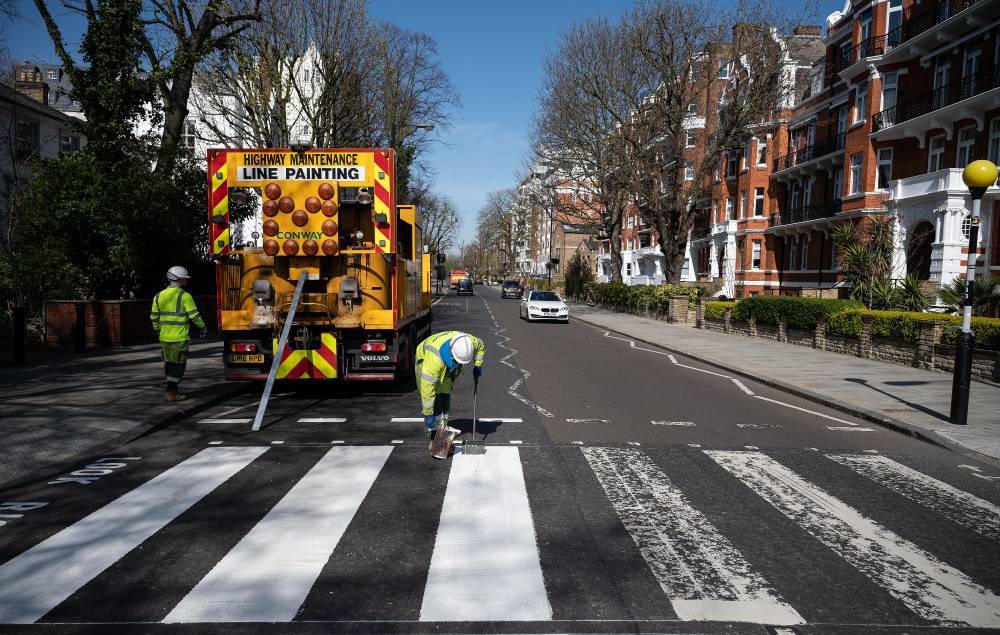 Abbey Road crosswalk made famous by Beatles repainted during coronavirus lockdown - www.nme.com