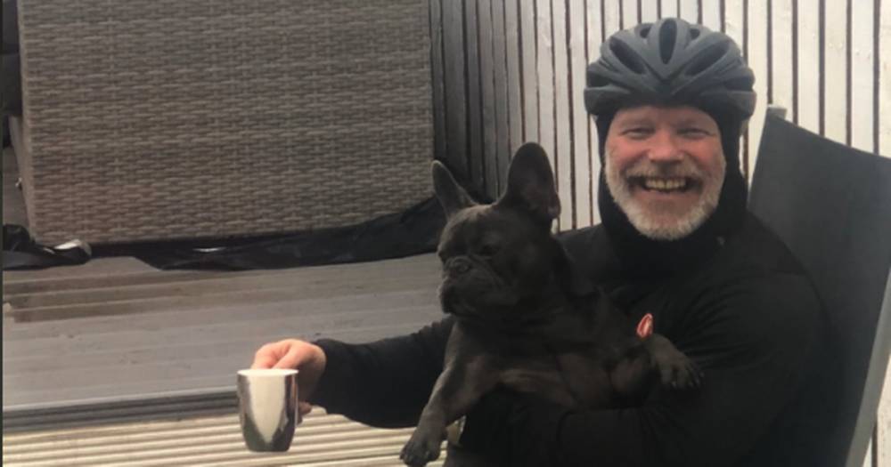 Watch brilliant moment John 'Yogi' Hughes visits beloved family pooch after incredible 25-mile cycle journey - www.dailyrecord.co.uk