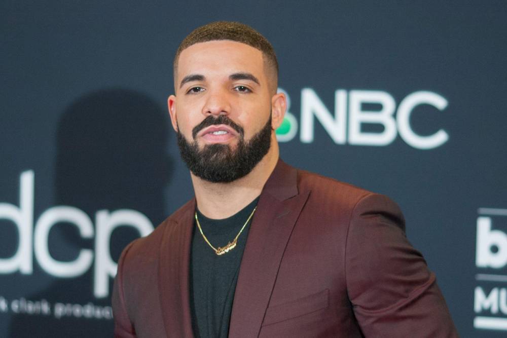 Drake gets emotional as he shares first picture with son - www.hollywood.com - France