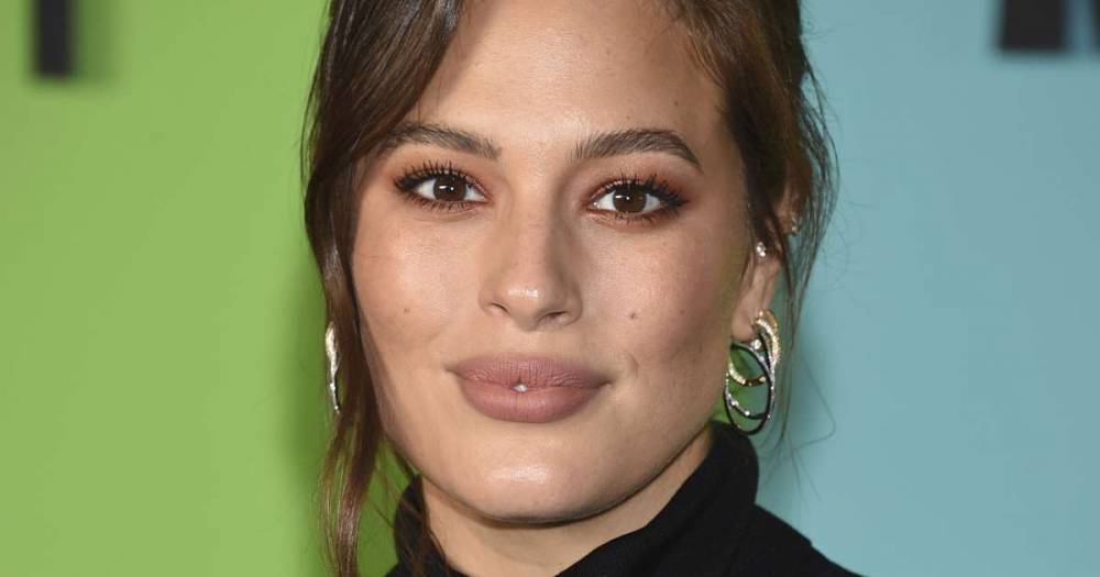 Ashley Graham shares sweet family portrait of herself with baby Isaac and husband Justin Ervin as they quarantine in the model's hometown - www.msn.com - New York