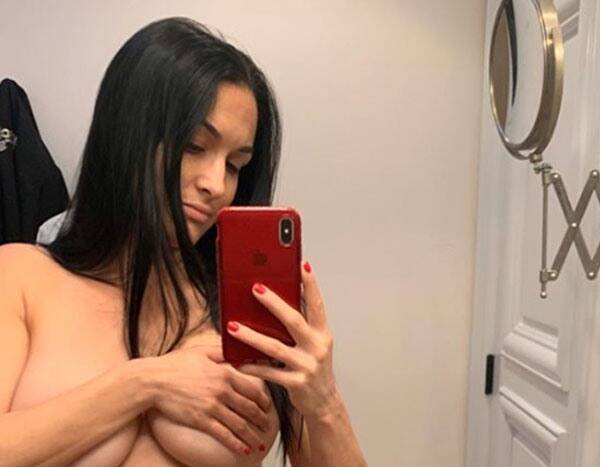 Nikki Bella Goes Topless & Reveals Her Pregnancy "Boobs Have Gotten Huge" - www.eonline.com