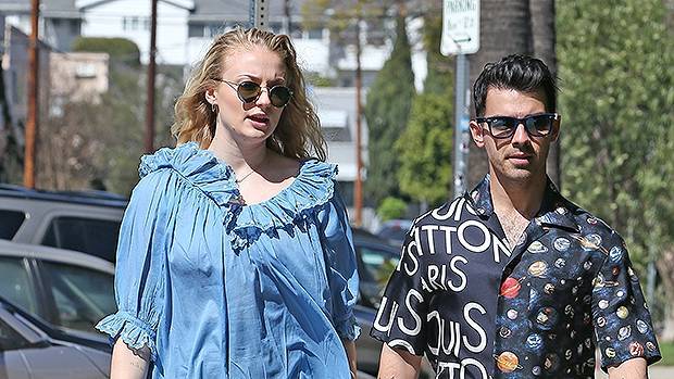 Sophie Turner’s Blue Dress Clings To Her Stomach In New Pics Amid Pregnancy Reports - hollywoodlife.com