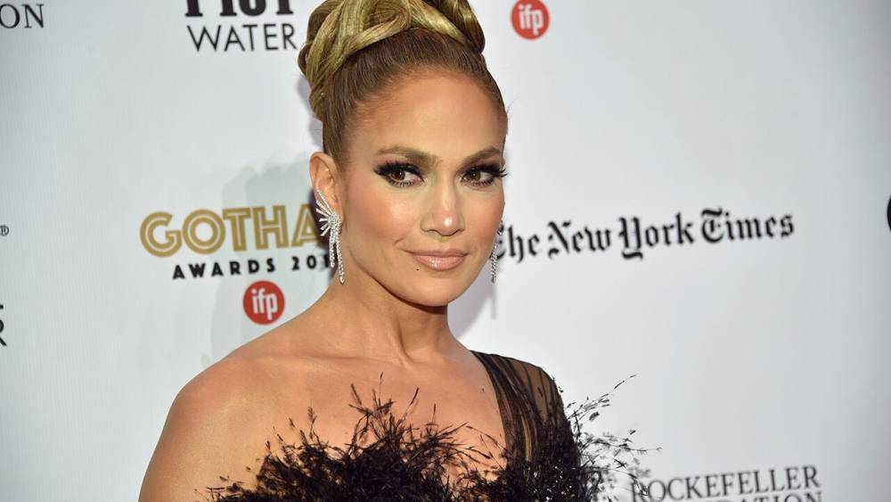 Jennifer Lopez flaunts curves, cleavage in plunging white swimsuit - flipboard.com