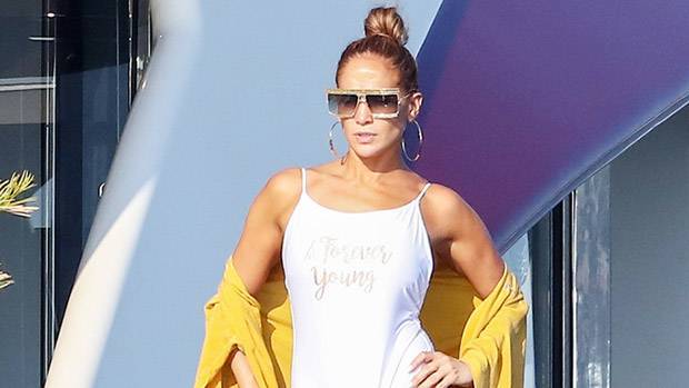 Jennifer Lopez Hits The Beach In A Sexy, White Plunging Swimsuit - hollywoodlife.com