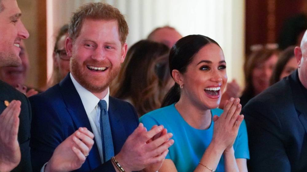See Prince Harry and Meghan Markle React After Couple Gets Engaged in Front of Them - www.etonline.com - London