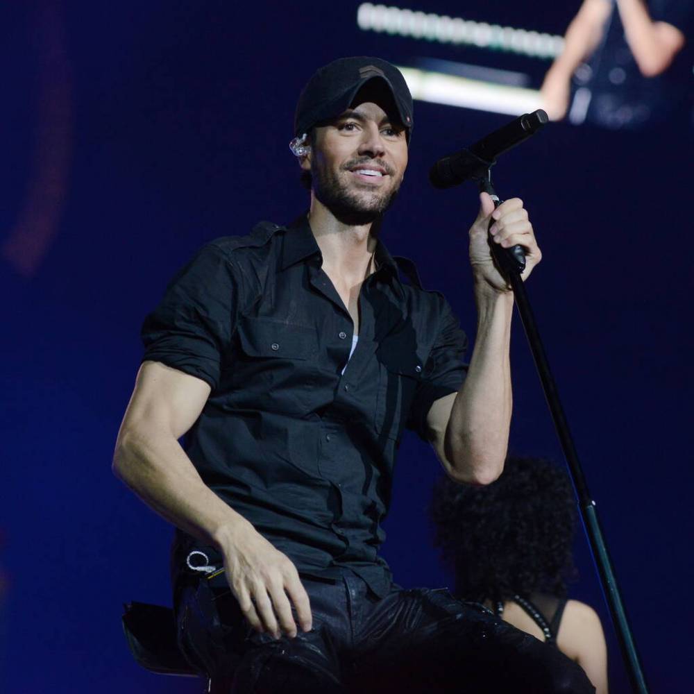 Enrique Iglesias was ‘a little scared’ introducing twins to new baby - www.peoplemagazine.co.za