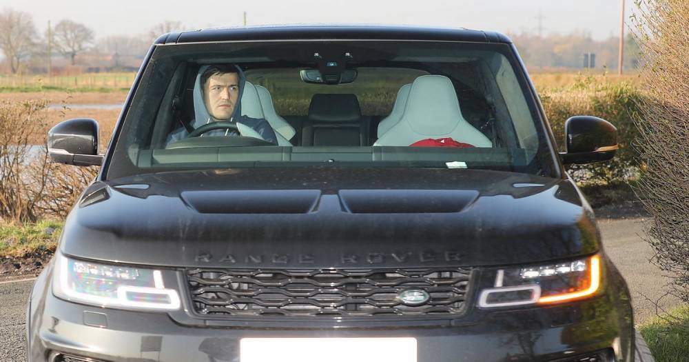 Harry Maguire arrives at Manchester United training ground after ankle injury - www.manchestereveningnews.co.uk - Manchester