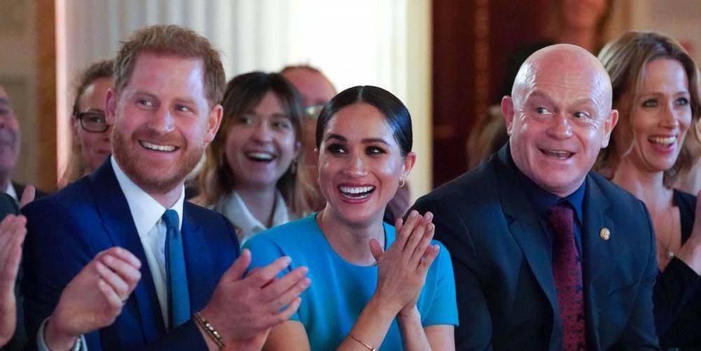 Meghan Markle and Prince Harry's Reaction to a Couple's Surprise Engagement Is So Cute - www.cosmopolitan.com - London