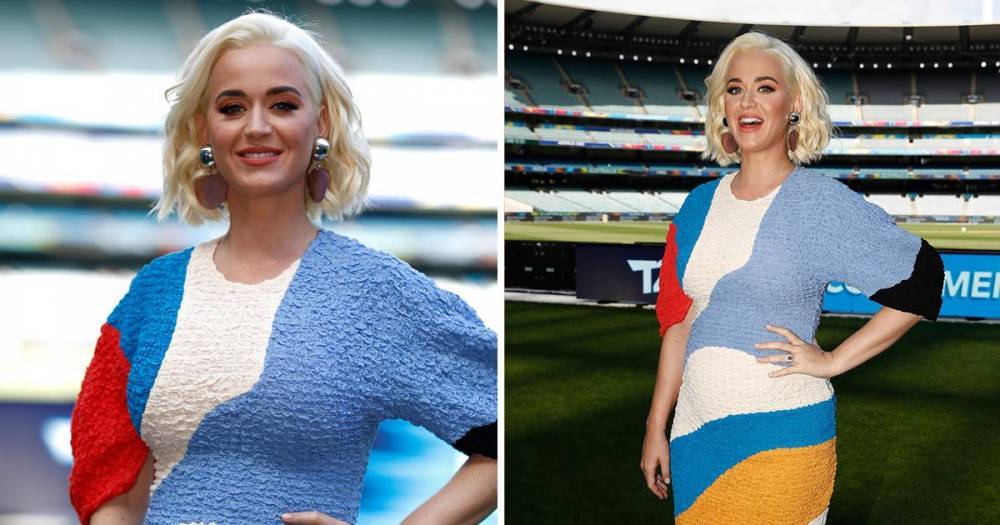 Katy Perry flaunts blossoming baby bump in multicoloured dress following pregnancy announcement - www.ok.co.uk - Australia