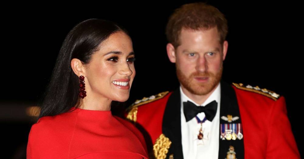 Meghan Markle dazzles in red as she matches Prince Harry's military uniform at the Royal Albert Hall - www.ok.co.uk