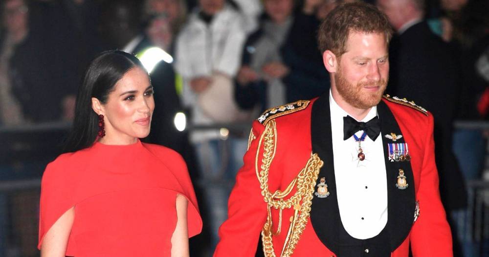 Prince Harry and Meghan Markle Hold Hands in Matching Red at Mountbatten Festival of Music: Photos - www.usmagazine.com - London - county Hand