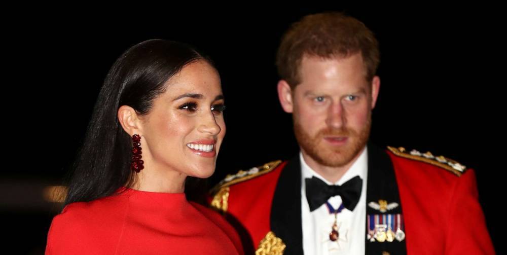 Meghan Markle Stuns in Red Cape Dress With Prince Harry at the Mountbatten Festival of Music - www.elle.com