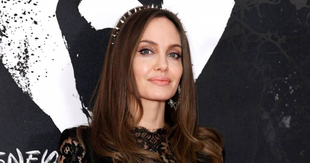 Angelina Jolie Reveals She Spent 2 Months ‘In and Out of Surgeries’ With Her Daughters in Powerful Essay - www.usmagazine.com