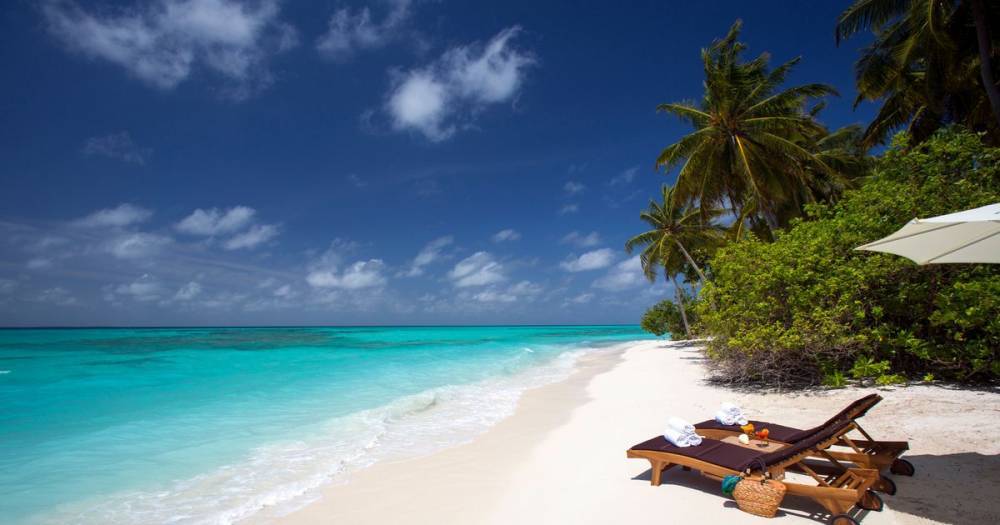 Tourists quarantined at two luxury Maldives resorts over coronavirus fears - www.manchestereveningnews.co.uk - India - Maldives