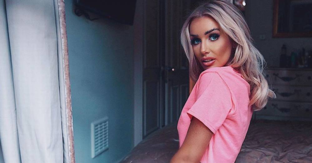 Love Island's Laura Anderson blasted by trolls for NHS post in tiny shorts - www.dailyrecord.co.uk