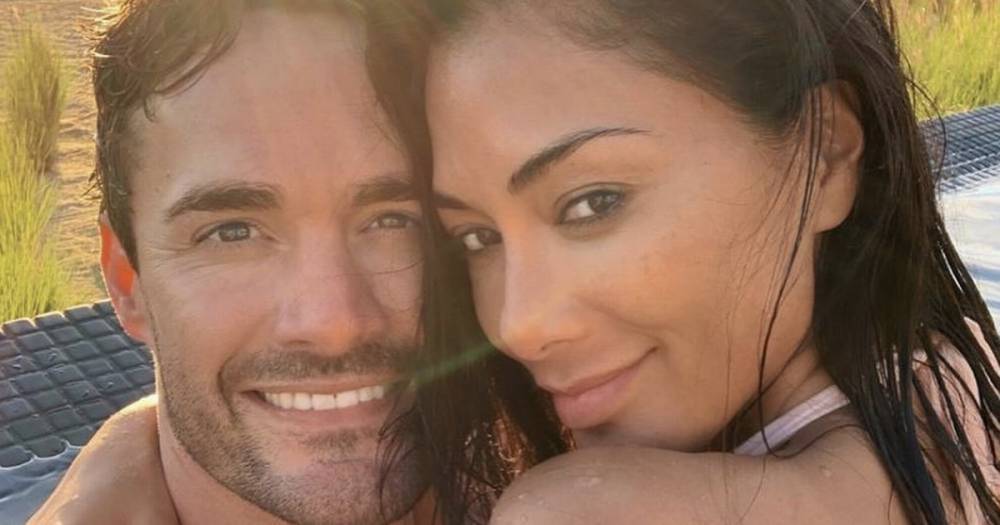 Thom Evans sends fans into frenzy as they predict he'll propose to Nicole Scherzinger - www.ok.co.uk