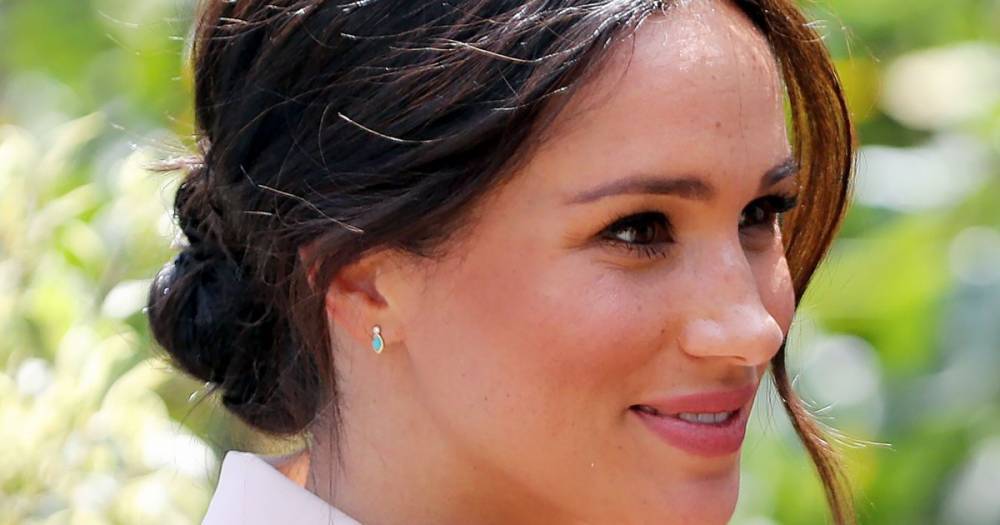Meghan Markle’s Trademark Messy Bun Was an Intentional Blend of Royal and Trendy - www.usmagazine.com