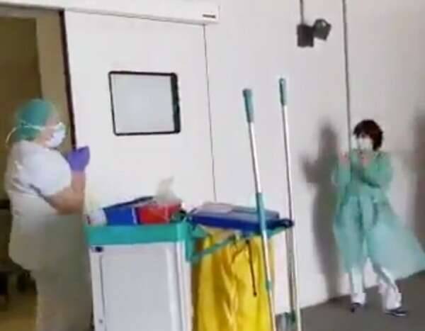 Watch Healthcare Workers Applaud Cleaning Staff for Their Hard Work in Heartwarming Video - www.eonline.com