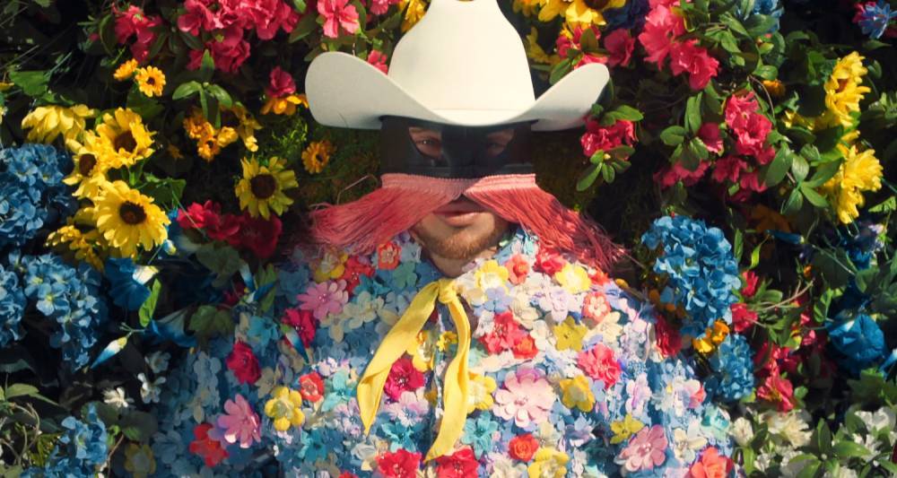 Orville Peck Is Decked Out In Flowers for New Single 'Summertime' - Watch Video! - www.justjared.com - city Columbia