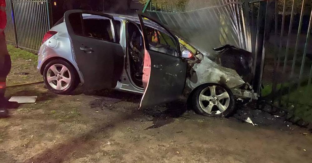 Driver makes off from scene of crash as car bursts into flames - www.manchestereveningnews.co.uk - Manchester