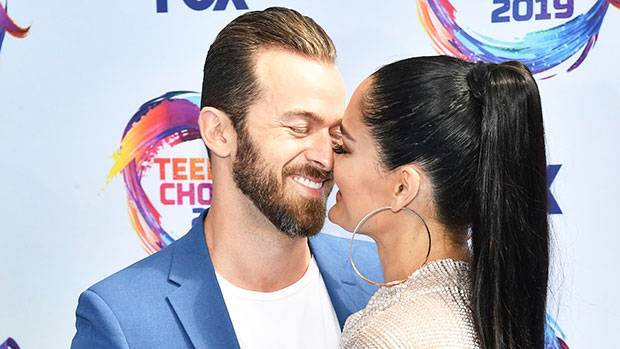 Nikki Bella Cradles Her 23-Week Baby Bump While Cozying Up To Artem In Sweet Pic - hollywoodlife.com