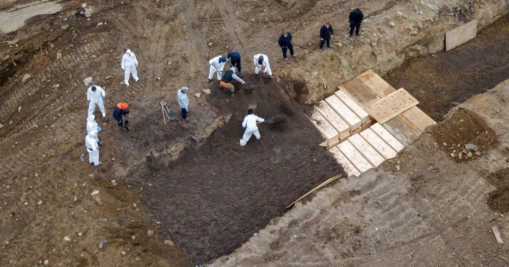 Mass graves dug in New York to bury coronavirus victims without family - www.dailyrecord.co.uk - New York - USA - New York