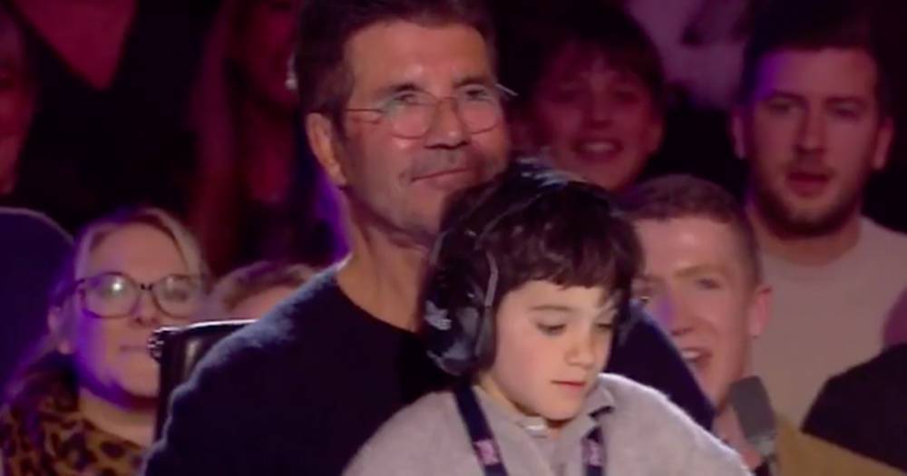 Simon Cowell's son Eric melts hearts as he appears on Britain's Got Talent during magic trick - www.ok.co.uk - Britain