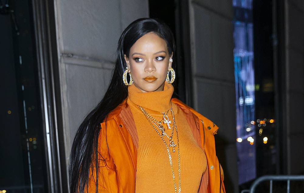 Rihanna tells fans to stop asking about her new album while she’s “trying to save the world” - www.nme.com