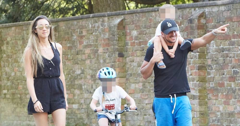 Peter Andre enjoys family time with wife Emily and kids after revealing they 'kiss through windows' - www.ok.co.uk