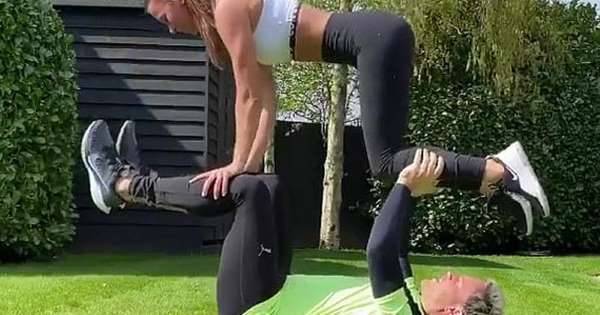 Olly Murs and his bodybuilder girlfriend Amelia Tank showcase their VERY impressive moves during al fresco couple's workout - www.msn.com