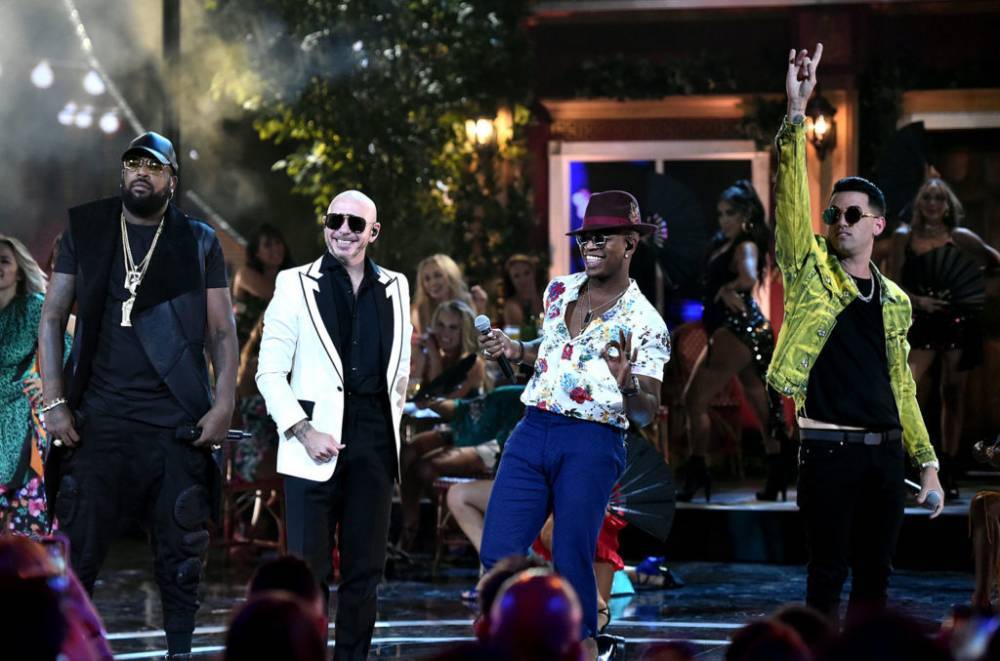 Pitbull, Ne-Yo, Lenier & El Micha's 'Me Quedaré Contigo' Hits No. 1 on Latin Airplay Chart - www.billboard.com