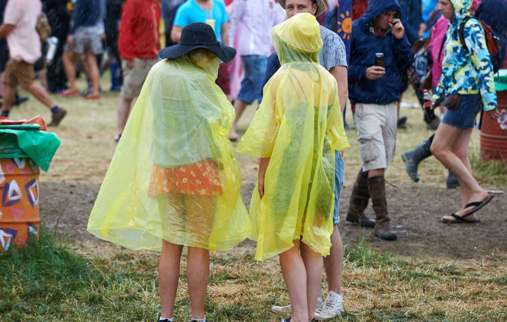 Glastonbury ponchos repurposed as PPE for NHS workers - www.nme.com - Britain