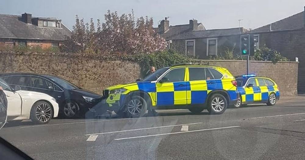Man arrested after police 'rammed' suspected stolen car into wall - www.manchestereveningnews.co.uk