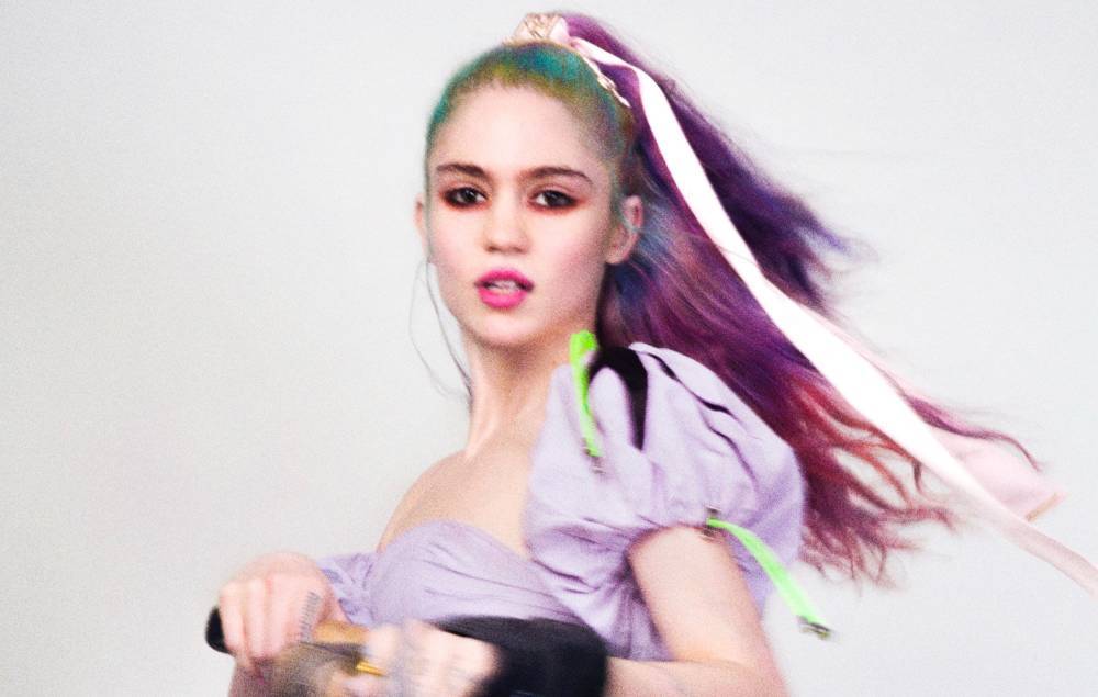 Grimes reflects on locking herself away to make ‘Visions’: “I did truly go insane” - www.nme.com
