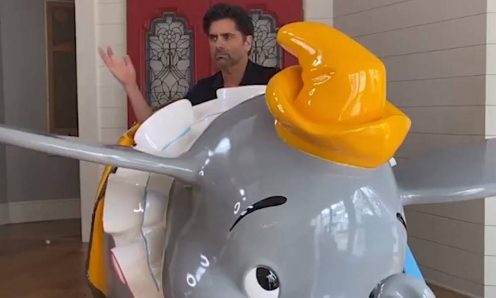 John Stamos Has a Giant Dumbo from Disneyland at His House! - www.justjared.com