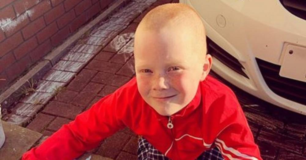 Eight-year-old schoolboy braves the shave and raises almost £1000 for NHS staff - www.dailyrecord.co.uk