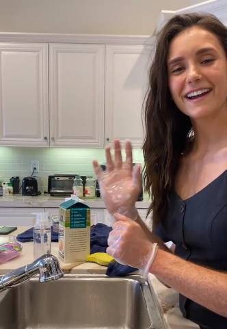 Nina Dobrev Washes Her Groceries In Hilarious Video With The Help Of A Mystery Man - etcanada.com