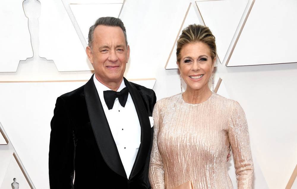 Tom Hanks has detailed the coronavirus symptoms he and his wife experienced - www.nme.com - Australia